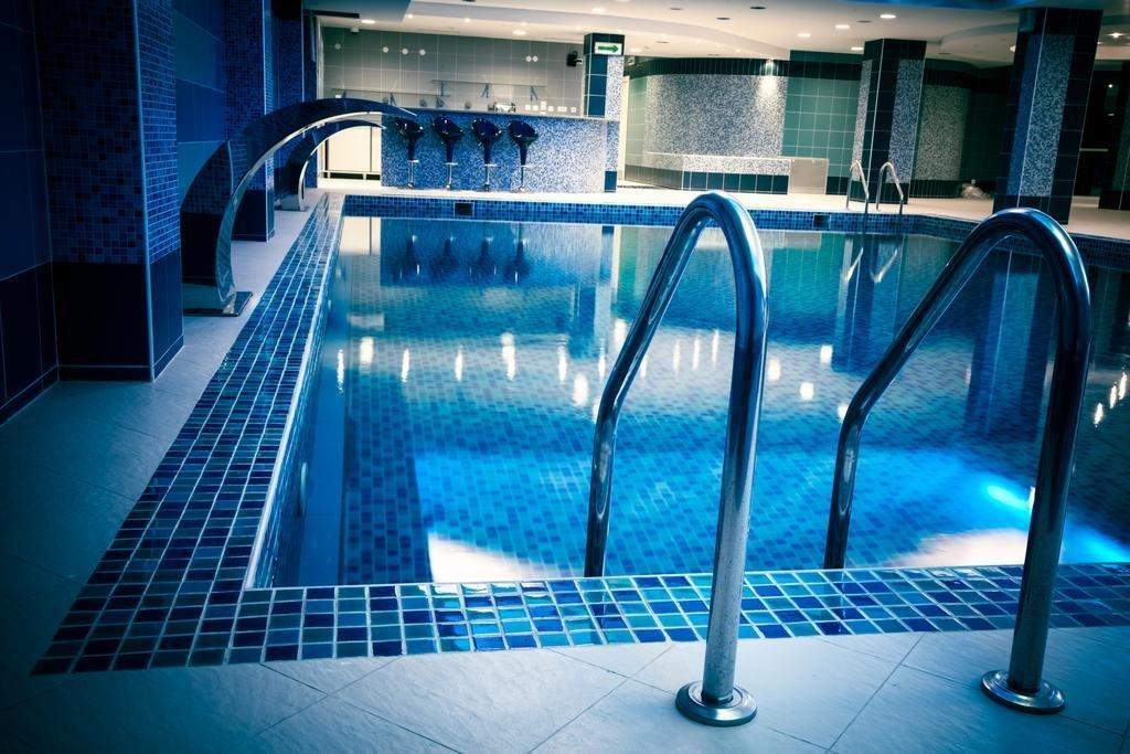 Отель Caspian Riviera Grand Palace Актау Экстерьер фото The swimming pool at the hotel