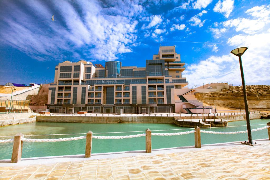 Отель Caspian Riviera Grand Palace Актау Экстерьер фото The new building of the University of Jordan