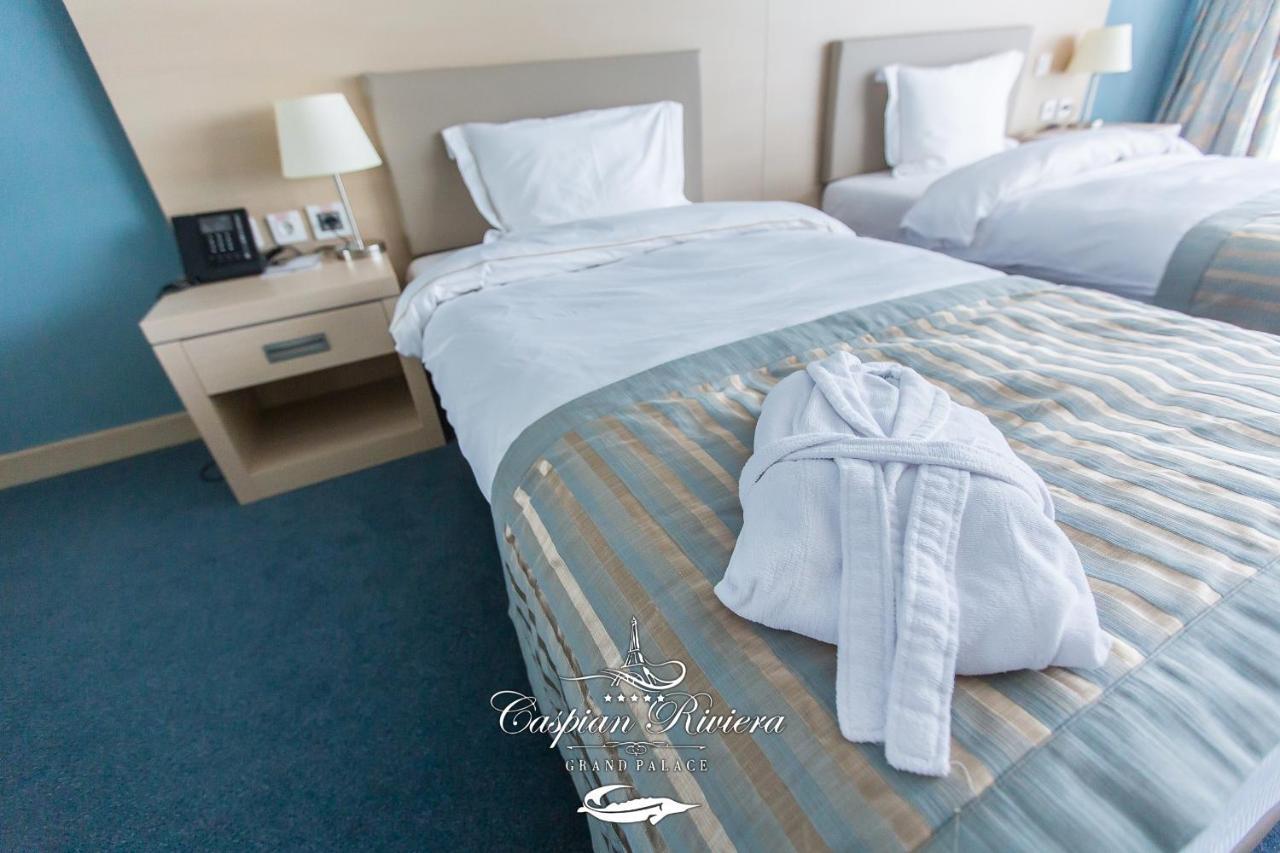 Отель Caspian Riviera Grand Palace Актау Экстерьер фото A room at the hotel